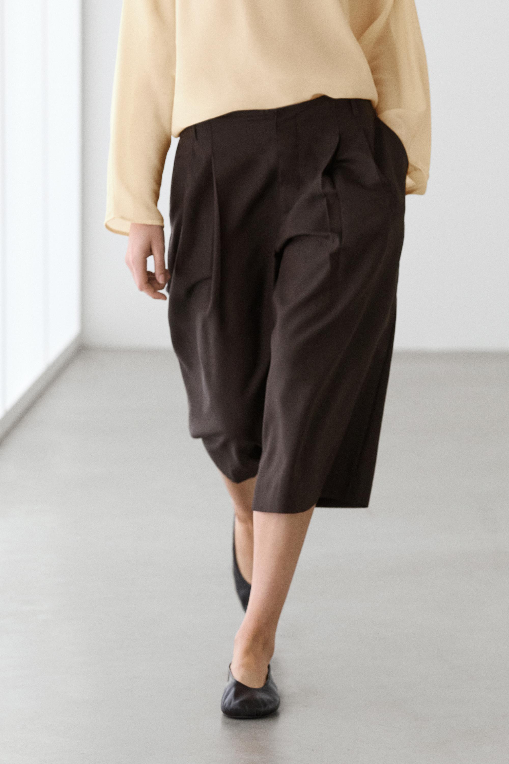 Long Bermuda shorts with striped detail